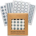 Four CLEANOMIC gray and white geometric patterned reusable kitchen cloths, stacked neatly on a clean surface.