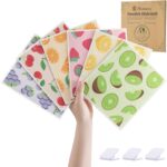 Set of 6 Homaxy Swedish dishcloths with various fruit patterns, displayed folded and in use cleaning kitchen surfaces.