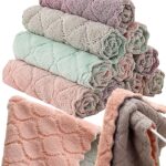 A stack of 12 coral velvet kitchen towels, neatly folded, showcasing their soft texture and absorbent material.