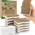 A dozen white cellulose and coconut fiber kitchen sponges, ergonomically shaped for easy grip, arranged neatly.