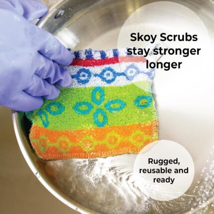 Four monochromatic Skoy Scrubs, round and flat, arranged neatly to showcase their texture and colors.